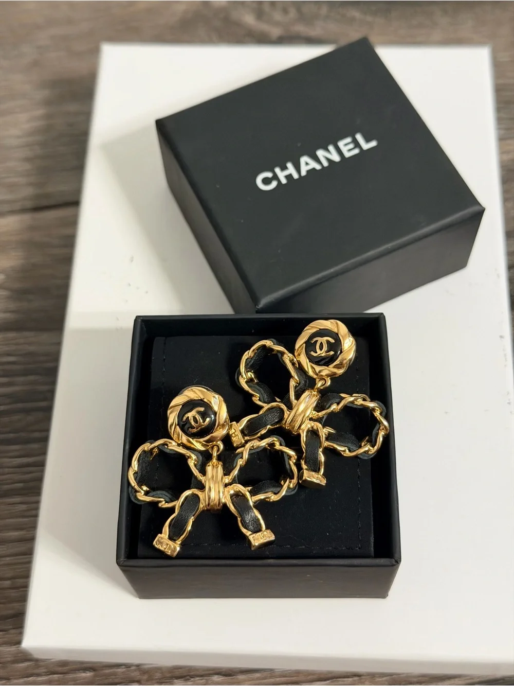 CHANEL Leather Bow CC Gold Dangle Earrings